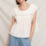 white embroidered blouse
embroidered summer top
white peasant blouse
lightweight rayon blouse
feminine summer top
casual white boutique top
embroidered detail shirt
relaxed fit white blouse
summer farmers market outfit
southern summer style
easy vacation outfit
white top with embroidery
flowy summer blouse
countryside summer fashion
casual feminine clothing
breathable warm weather top
white short sleeve blouse
classic summer wardrobe staple
boutique women's clothing
effortless everyday style