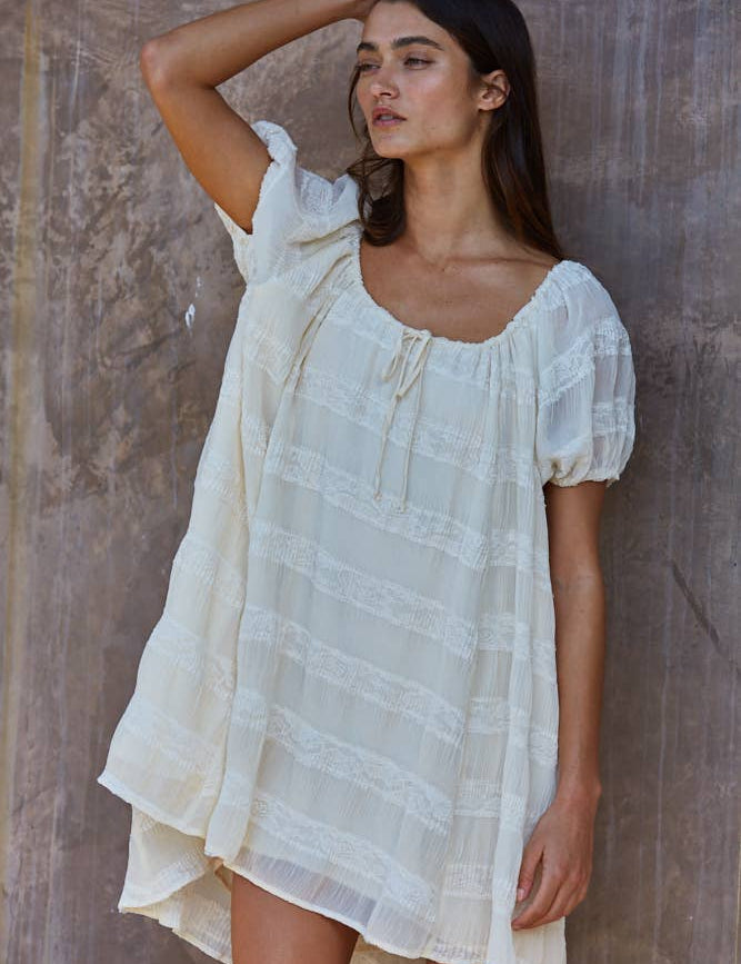 white oversized mini dress
flowy vacation dress women
off shoulder summer mini dress
lace detail oversized dress
beach coverup style mini dress
resort wear white dress women
airy summer vacation dress
relaxed fit white mini dress
italian summer inspired dress
summer spritz collection dress
bachelorette party dress
bridal casual dress
little white dress