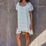 white oversized mini dress
flowy vacation dress women
off shoulder summer mini dress
lace detail oversized dress
beach coverup style mini dress
resort wear white dress women
airy summer vacation dress
relaxed fit white mini dress
italian summer inspired dress
summer spritz collection dress
bachelorette party dress
bridal casual dress
little white dress