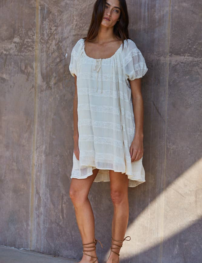 white oversized mini dress
flowy vacation dress women
off shoulder summer mini dress
lace detail oversized dress
beach coverup style mini dress
resort wear white dress women
airy summer vacation dress
relaxed fit white mini dress
italian summer inspired dress
summer spritz collection dress
bachelorette party dress
bridal casual dress
little white dress