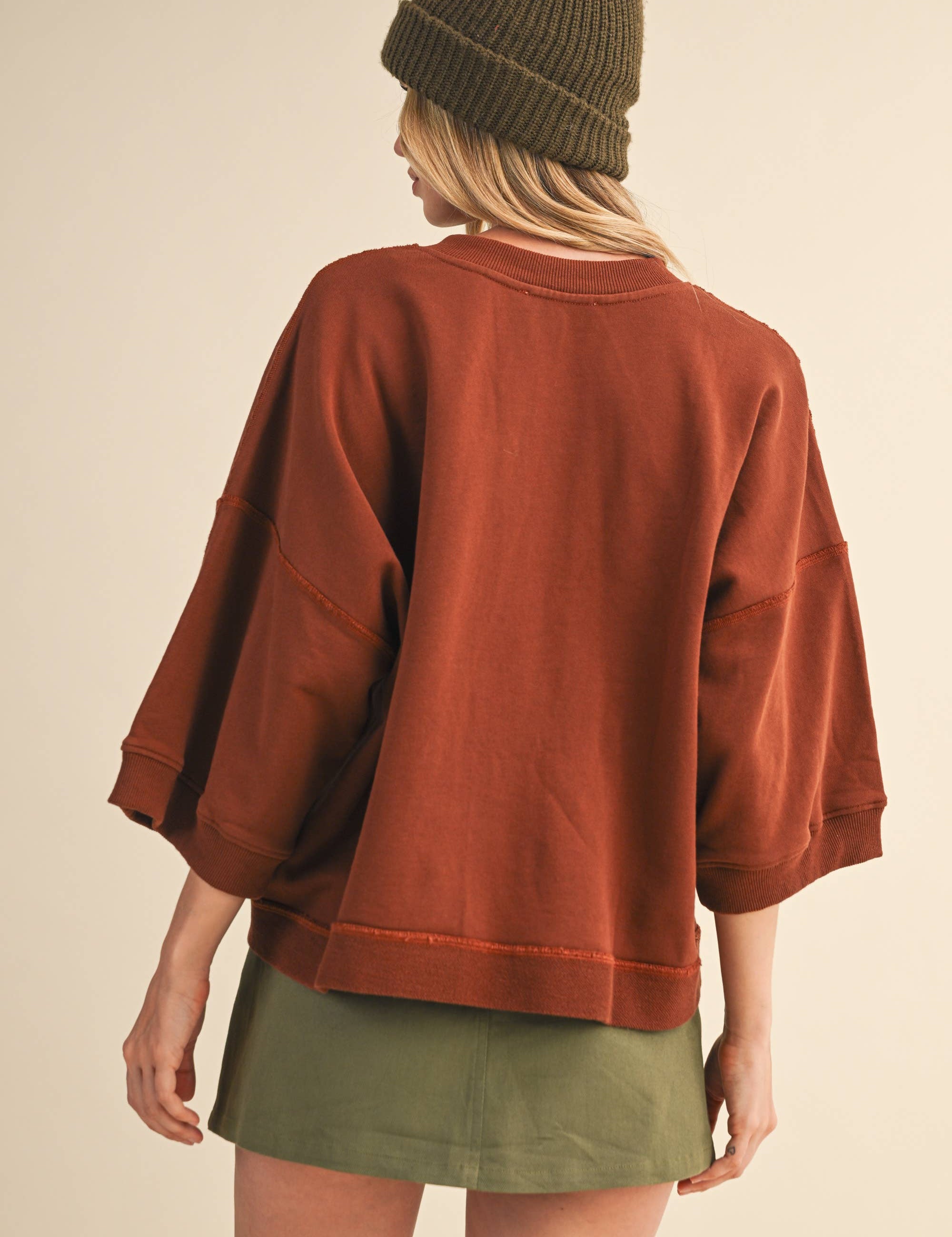 oversized button-up sweatshirt, cotton button-up sweatshirt, oversized cotton top, rust sweatshirt, exposed seam sweatshirt, relaxed fit sweatshirt, lightweight sweatshirt jacket, fall layering top, casual women's sweatshirt, boutique fall top, west of may boutique, free people dupe, boho style