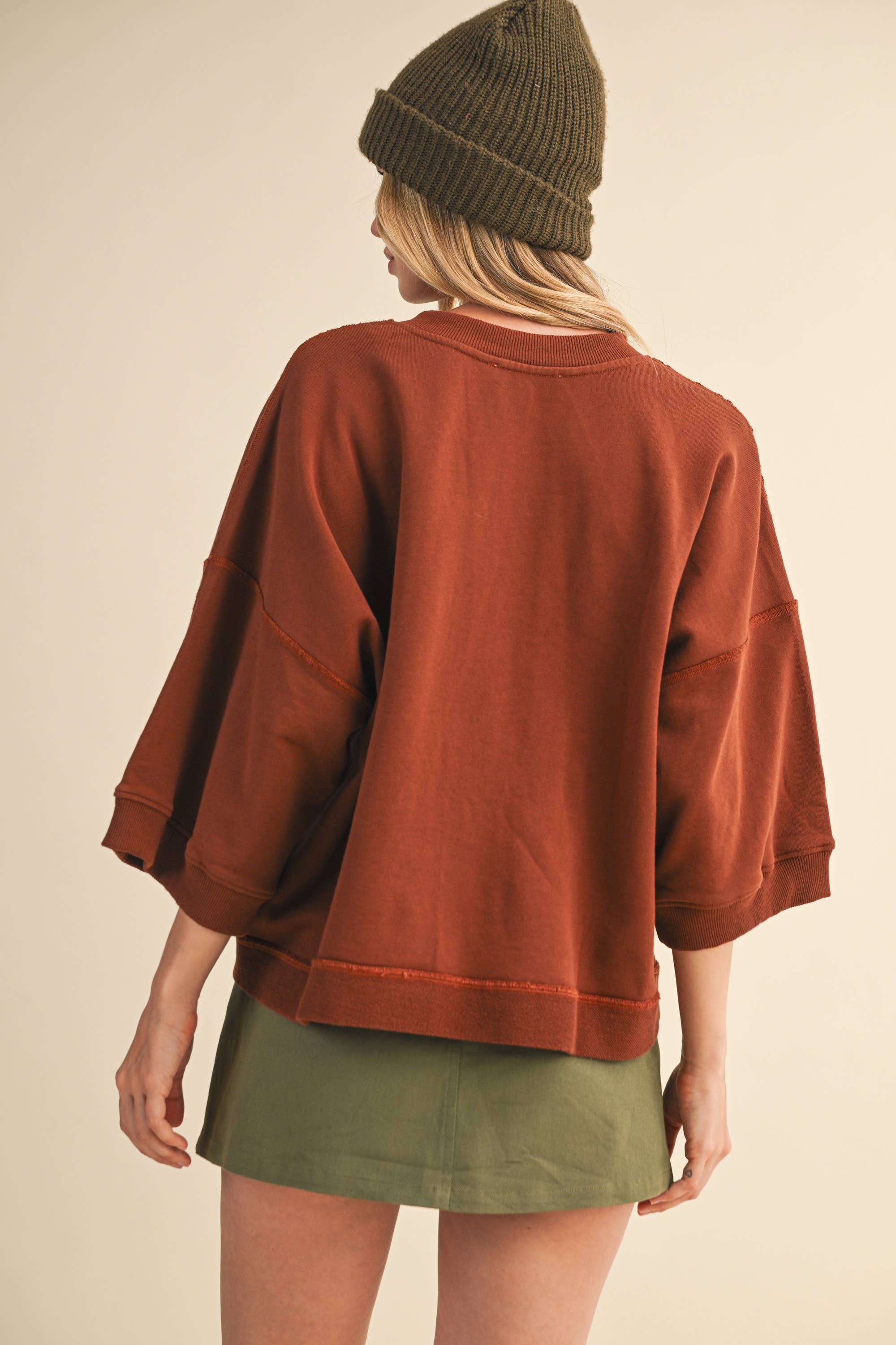 oversized button-up sweatshirt, cotton button-up sweatshirt, oversized cotton top, rust sweatshirt, exposed seam sweatshirt, relaxed fit sweatshirt, lightweight sweatshirt jacket, fall layering top, casual women's sweatshirt, boutique fall top, west of may boutique, free people dupe, boho style