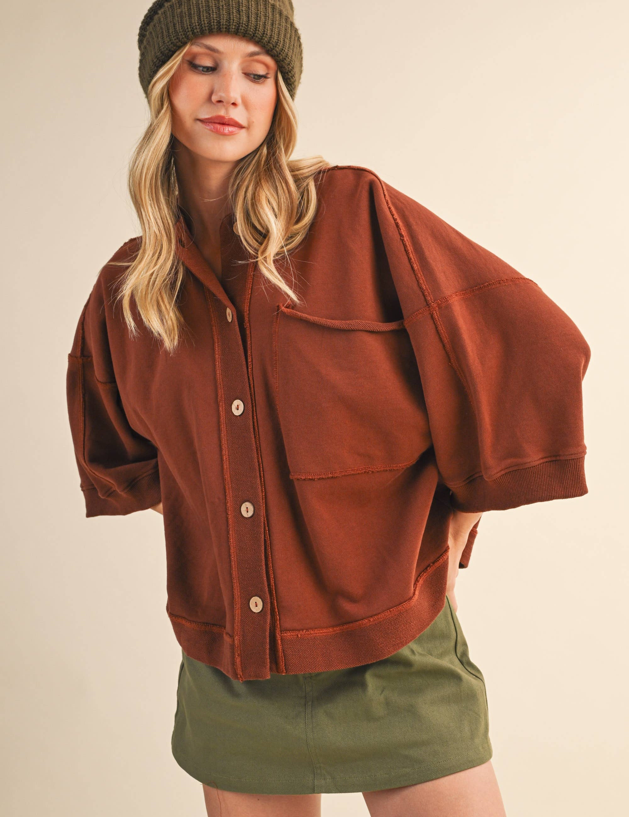 oversized button-up sweatshirt, cotton button-up sweatshirt, oversized cotton top, rust sweatshirt, exposed seam sweatshirt, relaxed fit sweatshirt, lightweight sweatshirt jacket, fall layering top, casual women's sweatshirt, boutique fall top, west of may boutique, free people dupe, boho style
