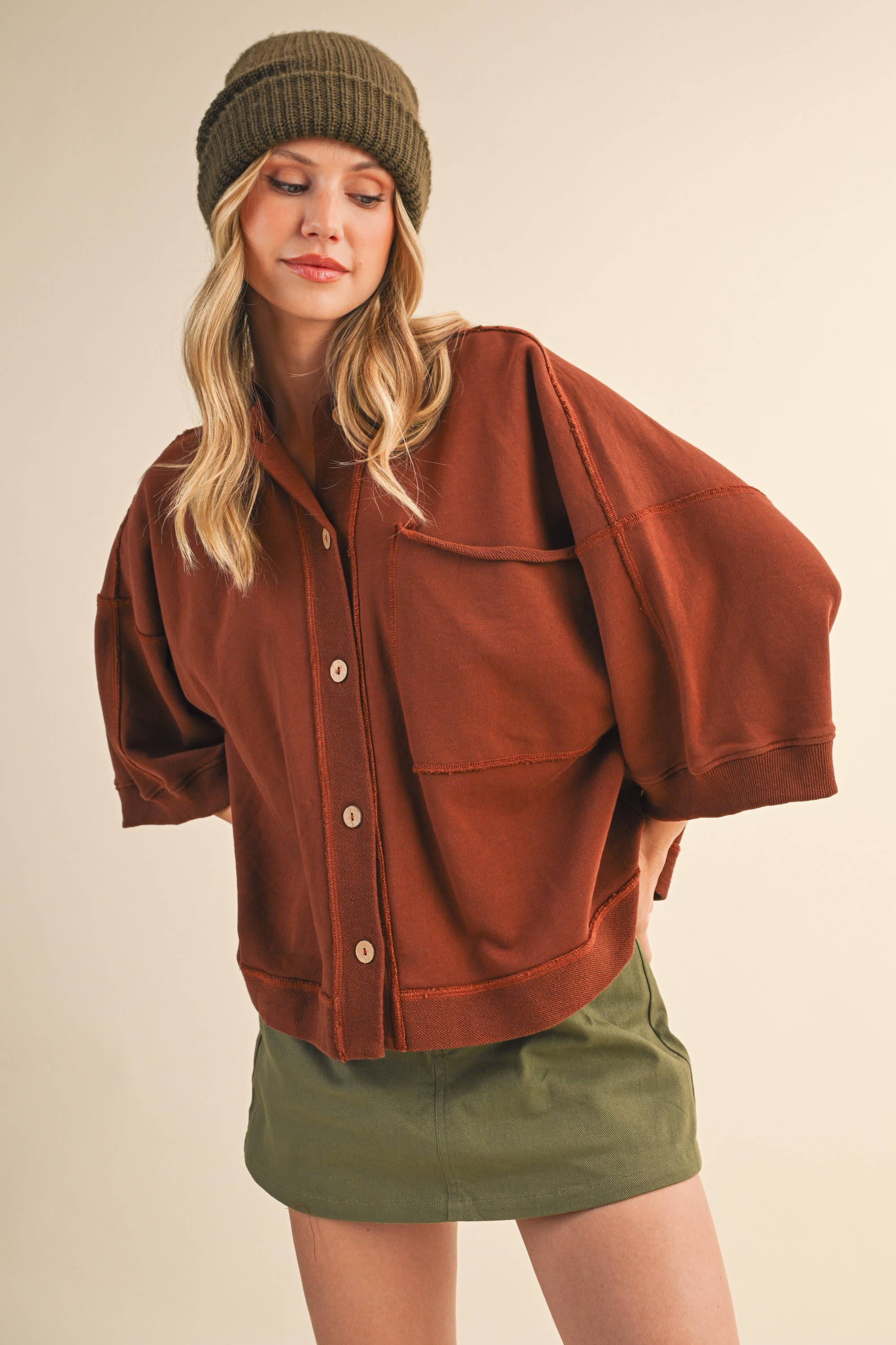oversized button-up sweatshirt, cotton button-up sweatshirt, oversized cotton top, rust sweatshirt, exposed seam sweatshirt, relaxed fit sweatshirt, lightweight sweatshirt jacket, fall layering top, casual women's sweatshirt, boutique fall top, west of may boutique, free people dupe, boho style