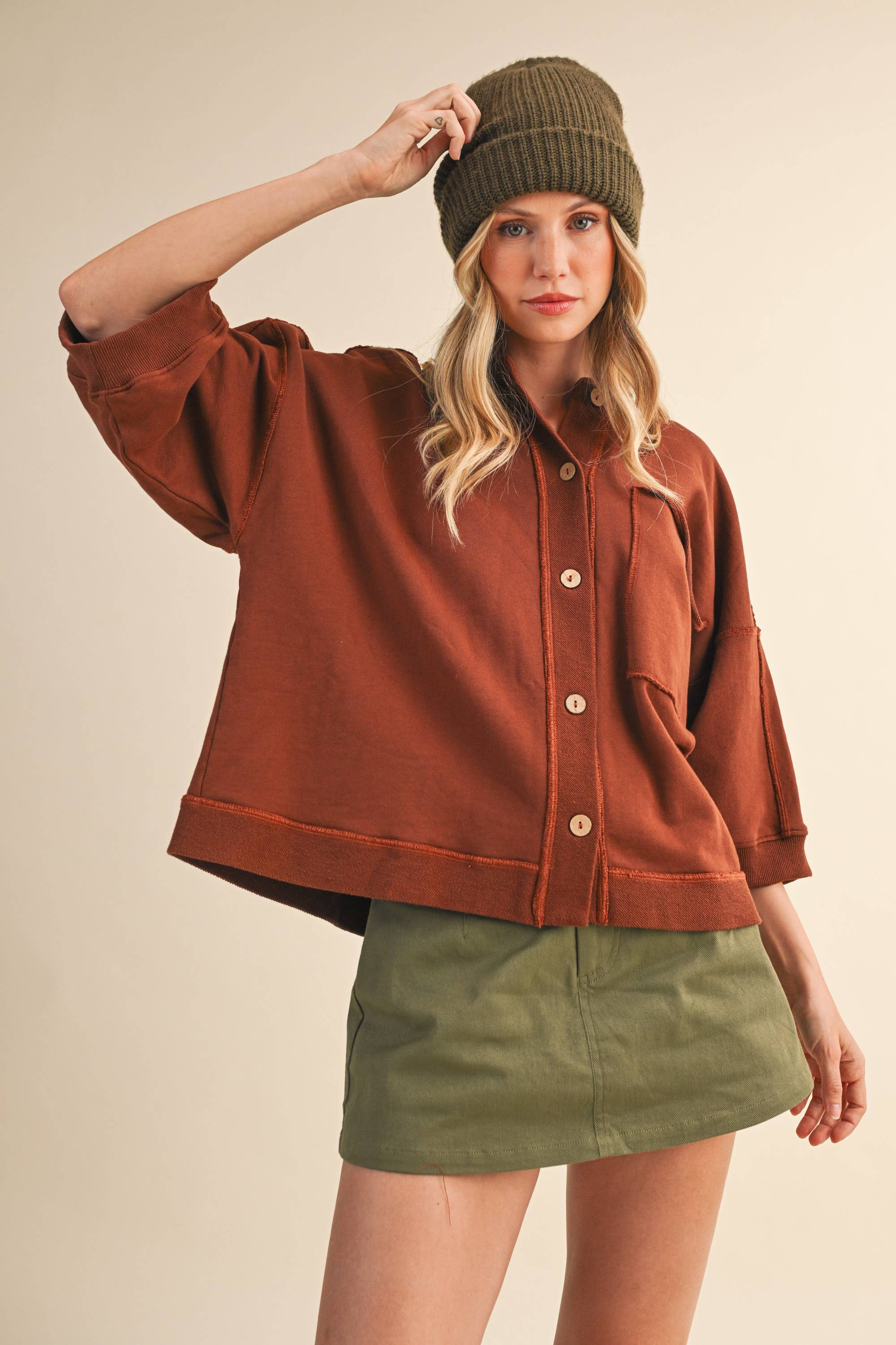 oversized button-up sweatshirt, cotton button-up sweatshirt, oversized cotton top, rust sweatshirt, exposed seam sweatshirt, relaxed fit sweatshirt, lightweight sweatshirt jacket, fall layering top, casual women's sweatshirt, boutique fall top, west of may boutique, free people dupe, boho style