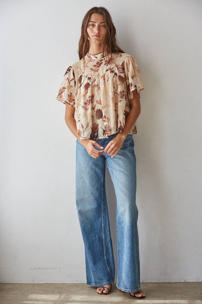 women's cream floral blouse, cream and brown floral top, brown floral blouse women, floral mock neck blouse, fall floral blouse, women's chiffon floral top, short sleeve floral blouse, flutter sleeve floral top, vintage floral blouse, western floral blouse, prairie floral top, boho western blouse, women's fall blouse, neutral floral top, cream fall top women, brown floral fall top, floral top with jeans, western fall outfit women, cowgirl fall outfit, women's western clothing, women's boutique tops