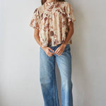women's cream floral blouse, cream and brown floral top, brown floral blouse women, floral mock neck blouse, fall floral blouse, women's chiffon floral top, short sleeve floral blouse, flutter sleeve floral top, vintage floral blouse, western floral blouse, prairie floral top, boho western blouse, women's fall blouse, neutral floral top, cream fall top women, brown floral fall top, floral top with jeans, western fall outfit women, cowgirl fall outfit, women's western clothing, women's boutique tops