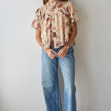 women's cream floral blouse, cream and brown floral top, brown floral blouse women, floral mock neck blouse, fall floral blouse, women's chiffon floral top, short sleeve floral blouse, flutter sleeve floral top, vintage floral blouse, western floral blouse, prairie floral top, boho western blouse, women's fall blouse, neutral floral top, cream fall top women, brown floral fall top, floral top with jeans, western fall outfit women, cowgirl fall outfit, women's western clothing, women's boutique tops