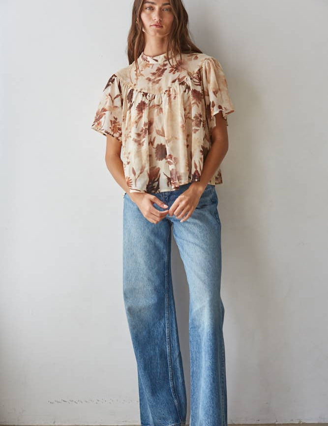 women's cream floral blouse, cream and brown floral top, brown floral blouse women, floral mock neck blouse, fall floral blouse, women's chiffon floral top, short sleeve floral blouse, flutter sleeve floral top, vintage floral blouse, western floral blouse, prairie floral top, boho western blouse, women's fall blouse, neutral floral top, cream fall top women, brown floral fall top, floral top with jeans, western fall outfit women, cowgirl fall outfit, women's western clothing, women's boutique tops