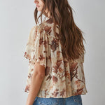 women's cream floral blouse, cream and brown floral top, brown floral blouse women, floral mock neck blouse, fall floral blouse, women's chiffon floral top, short sleeve floral blouse, flutter sleeve floral top, vintage floral blouse, western floral blouse, prairie floral top, boho western blouse, women's fall blouse, neutral floral top, cream fall top women, brown floral fall top, floral top with jeans, western fall outfit women, cowgirl fall outfit, women's western clothing, women's boutique tops