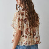 women's cream floral blouse, cream and brown floral top, brown floral blouse women, floral mock neck blouse, fall floral blouse, women's chiffon floral top, short sleeve floral blouse, flutter sleeve floral top, vintage floral blouse, western floral blouse, prairie floral top, boho western blouse, women's fall blouse, neutral floral top, cream fall top women, brown floral fall top, floral top with jeans, western fall outfit women, cowgirl fall outfit, women's western clothing, women's boutique tops