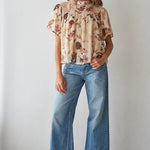 women's cream floral blouse, cream and brown floral top, brown floral blouse women, floral mock neck blouse, fall floral blouse, women's chiffon floral top, short sleeve floral blouse, flutter sleeve floral top, vintage floral blouse, western floral blouse, prairie floral top, boho western blouse, women's fall blouse, neutral floral top, cream fall top women, brown floral fall top, floral top with jeans, western fall outfit women, cowgirl fall outfit, women's western clothing, women's boutique tops