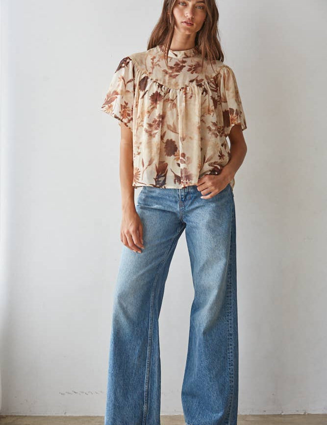 women's cream floral blouse, cream and brown floral top, brown floral blouse women, floral mock neck blouse, fall floral blouse, women's chiffon floral top, short sleeve floral blouse, flutter sleeve floral top, vintage floral blouse, western floral blouse, prairie floral top, boho western blouse, women's fall blouse, neutral floral top, cream fall top women, brown floral fall top, floral top with jeans, western fall outfit women, cowgirl fall outfit, women's western clothing, women's boutique tops